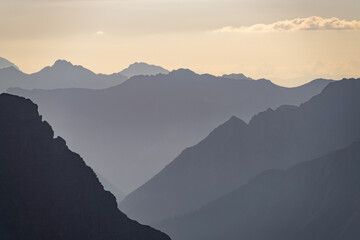 Abstract silhouette view of the alps allgäu between austria and germany at sunrise