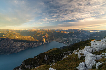 North side of lake garda at sunrise with view of the mountains and city turbel and riva del garda....
