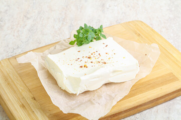 Greek Feta cheese over board