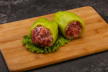 Raw stuffed pepper for cooking