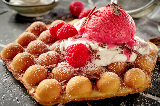 Traditional egg waffle or bubble waffle topped with ice cream