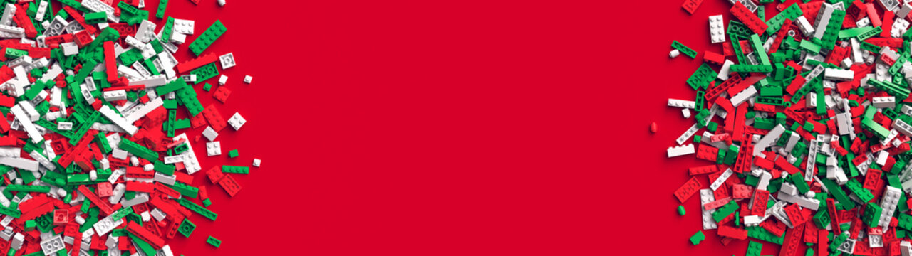 Double border of red green and white toy bricks on red background with place for your text. Toy bricks in traditional christmas colors. Educational toy for children. 3d rendering