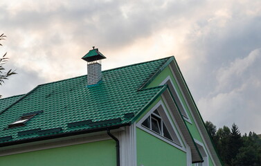 roof covered with metal tiles, roofing, wooden house