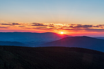 Sunset from Dlouhe strane hill in Jeseniky mountains in Czech republic