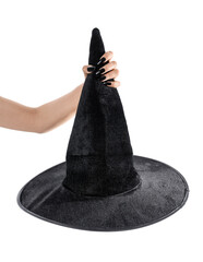 Witch's hand holding black hat isolated on white background