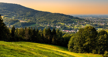 Fototapeta na wymiar Panoramic view of northern slope of Little Beskids in of Beskidy Mountains with Targanice Village near Andrychow town in Lesser Poland