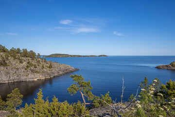 Northern nature. Karelian skerries. lake Ladoga. Channel of lake Ladoga with stony banks.