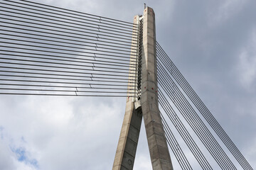 Close details of old large suspension bridge.