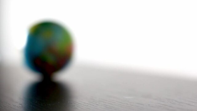 Europe Earth Globe Ball Rolling Into And Out Of Focus