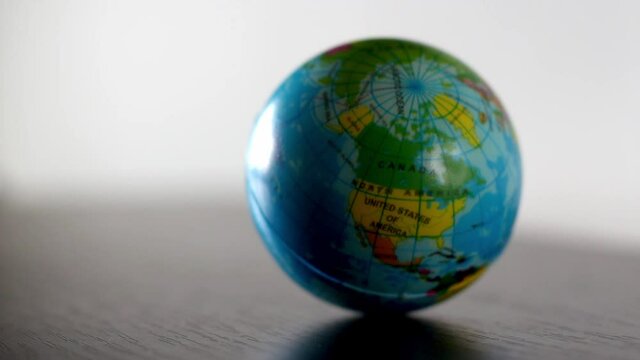 North America Earth Globe Ball Rolling Into And Out Of Focus