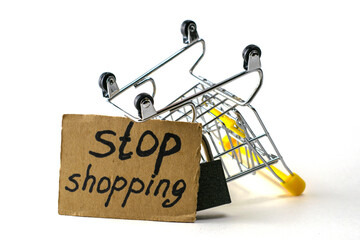 the concept of refusing to buy reasonable consumption is an inverted shopping cart with a padlock...
