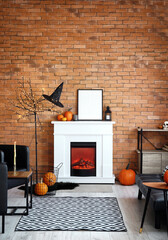 Fireplace with frame in living room decorated for Halloween
