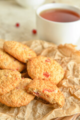 Fresh cranberry cookies on table, closeup