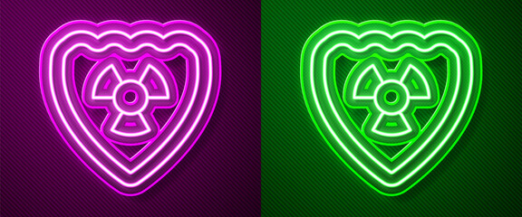Glowing neon line Radioactive in shield icon isolated on purple and green background. Radioactive toxic symbol. Radiation Hazard sign. Vector