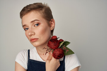 short haired woman in a sundress fashion cosmetics cropped view