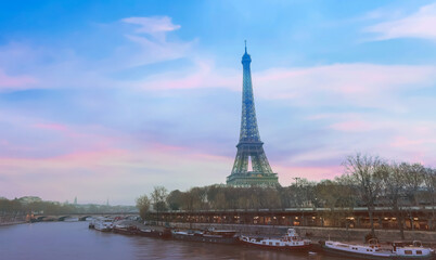 Fototapeta na wymiar Panoramic view in Paris Eiffel Tower and river Seine in Paris, France. Eiffel Tower is one of the most iconic landmarks of Paris.