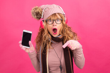 woman with headphones and mobile phone isolated on background