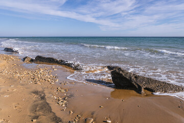 Halikounas Beach on a land strip between Ionian Sea and Korission Lake, Corfu Island, Greece