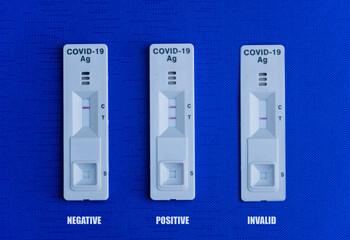 Photo of laboratory Covid-19 tests with 3 different results: positive, negative, invalid