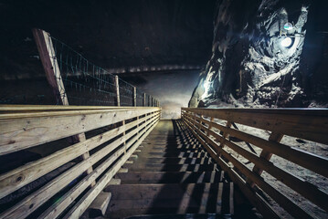Fototapeta premium Stairs in undergrounds of salt mine in Cacica village, Romania