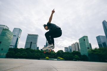 Skateboarder skateboarding outdoors in city © lzf