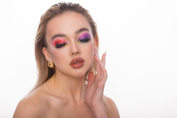 Fototapeta premium Beauty woman portrait. Professional makeup for model with blue eyes and big plump lips. Red lipstick, colored smoky eyes. Isolated on a white background. Space for text