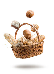 wicker basket with variety of bread jumping on white background