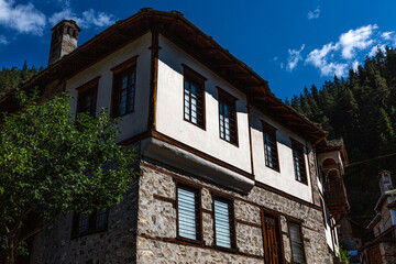 Old traditional stone house in small mountain village