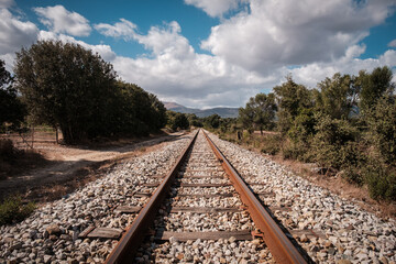 View along the parallel lines of a railway track near Belgodere in the Balagne region of Corsica