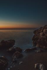 rocky coast of the mediterranean sea at dawn