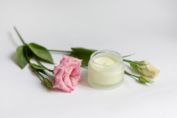 Fototapeta na wymiar Cream in a jar on a white background