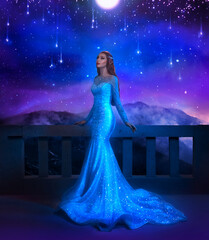 Fantasy woman princess stands on balcony looks at night sky space cosmos stars. Girl enjoy magic...