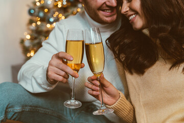 Cinematic image of a couple celebrating christmas at home.