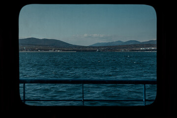 View of the mountains near Gelendzhik through the window of a ship for sea trips