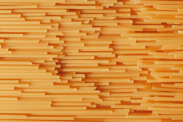 Spaghetti background - raw dry pasta texture