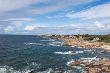 Landscape of the ocean and rocky coast in France, viewed from a drone.