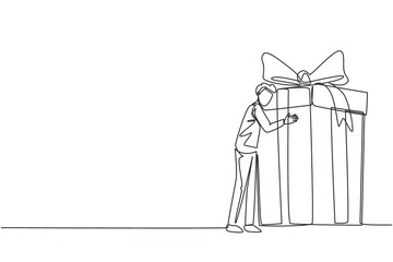 Fototapeta na wymiar Continuous one line drawing guy hugging huge birthday gift. Young satisfied man standing near wrapped birthday gift box with bow. Present, gift, birthday. Single line draw design vector illustration
