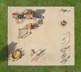 Modern playground with sand, slide and swing for children, aerial view