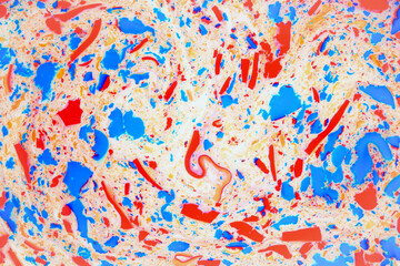 Colorful terrazzo texture. Multicolored spots and inclusions on a white, abstract background.