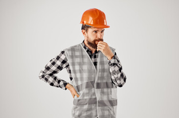 bearded man in orange hard hat construction professional isolated background