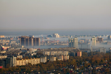 City panorama in autumn. Nizhny Novgorod. Morning fog over the city.