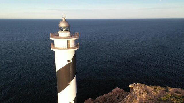 Moscarter lighthouse in Portinatx, a town in the north of the island of Ibiza. Images taken with drone 