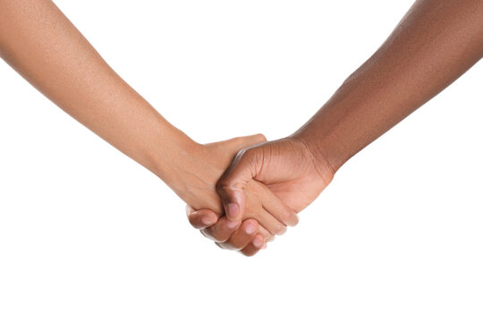 Woman and African American man shaking hands on white background, closeup