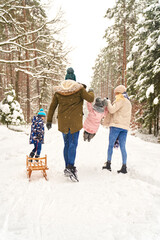 Fototapeta na wymiar Family spending time together in winter