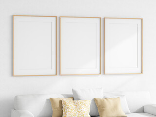 three frames mockup, gallery mockup, frame mockup in minimalist living room interior with white sofa, 3d render