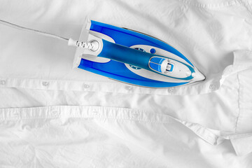 iron on wrinkled white shirt