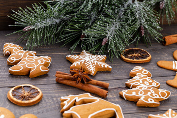 Homemade christmas gingerbread cookies on wooden table.