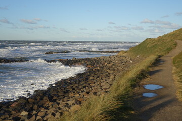 Hiking the coastal path of Lonstrup on a sunny and stormy day, Jammerbugt, Lonstrup, Hjorring,...