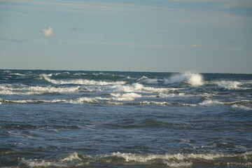Rough waters at Cape Grenen, meeting point of Skagerrak, North Sea (left) and Kattegat, Baltic Sea (right), Skagen, Northern Jutland, Denmark
