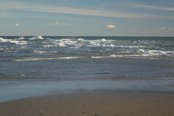 Rough waters at Cape Grenen, meeting point of Skagerrak, North Sea (left) and Kattegat, Baltic Sea (right), Skagen, Northern Jutland, Denmark
